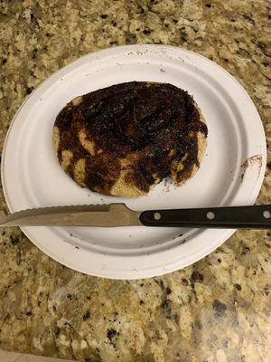 This is the chocolate chip bun that cost $17.99. The normal size steak knife is there for scale. 🤬😳😔 at Joseph's Organic Bakery in Miami