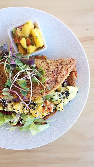 Chickpea Omlette with Mango Salasaand Avocado, Pomegranate  at The Origin in Christchurch
