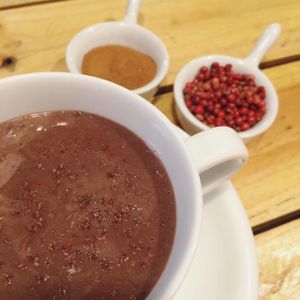 Hot cocoa (we can make a vegan version) with cinnamon and pink pepper at Itacate in Barcelona