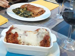 Lasagna with soy ragù and eggplants' parmigiana with sautéed endives (yummy!) at Un'Altra Idea in Bologna