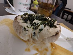 Raw portobello mushroom marinated in cashew paste sprinkled with toasted seaweed, just…divine!!! at Un'Altra Idea in Bologna