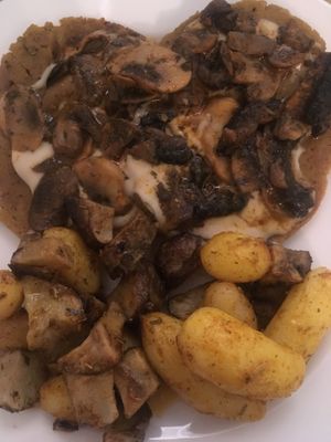 Seitan with mushrooms, potatoes, and Jerusalem artichokes  at Un'Altra Idea in Bologna