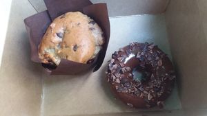 Vegan chocolate chip banana muffin and chocolate covered vanilla donut at Living Vine Organic Cafe in Fort Myers