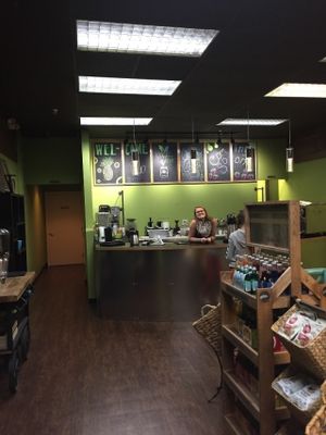 When you enter, you'll discover a warm feeling of soft colors leading to the front counter where a knowledgeable and smiling  face will greet you to take your order.  at Living Vine Organic Cafe in Fort Myers