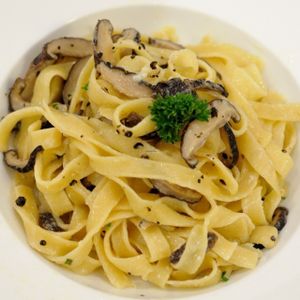 VEGAN CARBONARA
Home made spaghetti  with creamy, indulgent sauce made from healthy, high-protein tofu, topped with shiitake bacon, black pepper and parsley. at La Pasta in Siem Reap