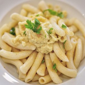 Vegan Alfredo - Penne with cauliflower florets, almond milk, extravirgin olive oil, lemon juice & Campot black pepper. Topped with vegan parmesan at La Pasta in Siem Reap