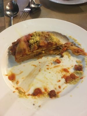 Half eaten lasagna 😋 at La Pasta in Siem Reap