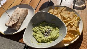 The vegan burrito & nachos with guacamole 🥑  at Pappare' in Bologna