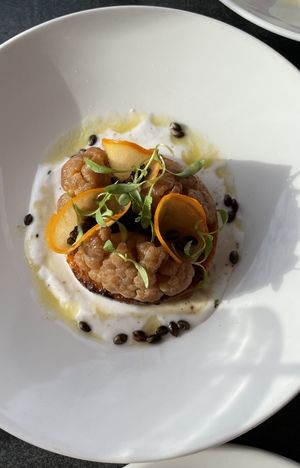 Tandori spiced butternut, pickled cauliflower, persimmon, coconut yogurt   at Cafe Sydney in Sydney