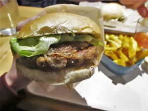 Burger with rösti, spinach and mustard at Season Square in Paris