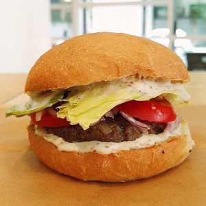 Season Burger with homemade patty and mayonnaise at Season Square in Paris