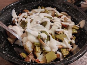 Baked Potatoes with cheese, sour cream, mushrooms. at La Rana Vegana in Cabo San Lucas