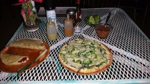 Vegan pizza with almond cheese at La Rana Vegana in Cabo San Lucas