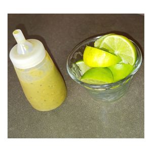 Hot sauce and limes at La Rana Vegana in Cabo San Lucas