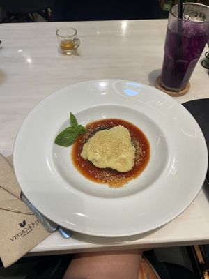 Portobello mushroom lasagne & butterfly pea tea. Quite filling considering the teeny size!   at Veganerie - Siam Paragon in Bangkok