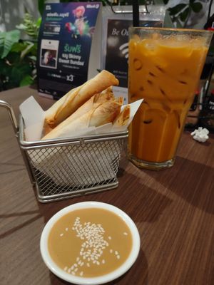 Cheesy spinach sticks are awesome 👍🏽👍🏽 milky Thai tea😋 at Veganerie - Siam Paragon in Bangkok