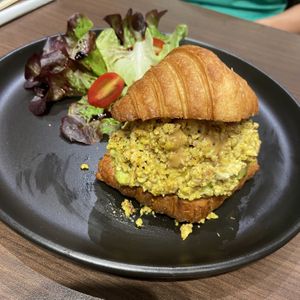 Tofu scramble, smashed avocado croissant   at Veganerie - Siam Paragon in Bangkok