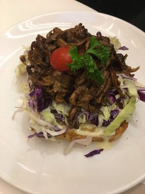 Sandwich with pulled vegan BBQ pork and coleslaw at Veganerie - Siam Paragon in Bangkok