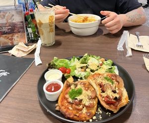 Bottom: pizza set, top: protein shake and khao soi  at Veganerie - Siam Paragon in Bangkok