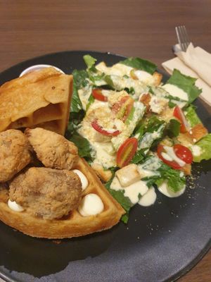 "chicken" and waffles with caeser salad 8. 5/10 The fried mushrooms that were 'chicken' were some of the best I ever had at Veganerie - Siam Paragon in Bangkok