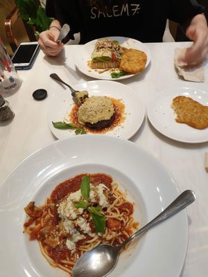 Meatball bolognaise, porobello mushroom lasagne, hash browns and avocado with bacon bits on toast ❤️ at Veganerie - Siam Paragon in Bangkok