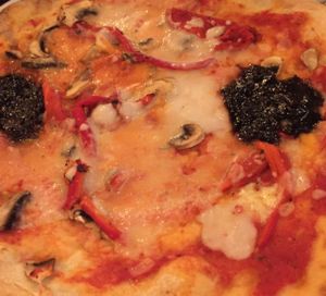 balsamic onions, mushrooms, roasted peppers and vegan cheese.  at Zizzi in Belfast