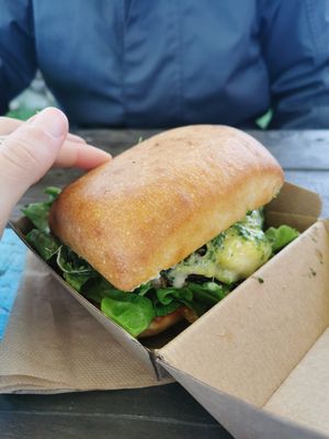 Zen's burger with pesto and cheddar at Zens Kitchen Food Truck in Murchison