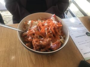 Health bowl including jerk quorn, chilli tofu, rice and salad. at Ahimsa The Vegan Cafe in North West London