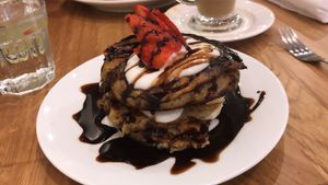 Blueberry breakfast pancakes with chocolate sauce 😋 at Ahimsa The Vegan Cafe in North West London