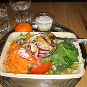 Salad bowl with vegan cheese, rice and guacamole. at Ahimsa The Vegan Cafe in North West London
