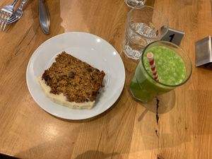 Carrot cake and smoothie  at Ahimsa The Vegan Cafe in North West London