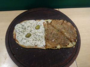 Pizza meio Muzzanut meio Cabolleta at Pizza Vegana - San Telmo  in Buenos Aires