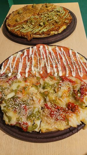 Four different types of vegan pizza at Pizza Vegana - San Telmo  in Buenos Aires