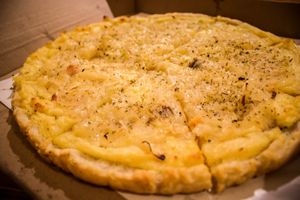 caramelised onion pizza at Pizza Vegana - San Telmo  in Buenos Aires