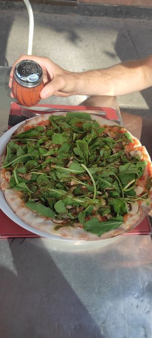 Funghi all pesto pizza with vegan cheese at Pizzeria Verace in Santiago