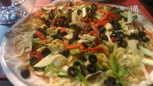 pizza with vegan cheese at Pizzeria Verace in Santiago
