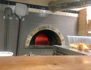 Wood oven for pizza at Gioia in Fano