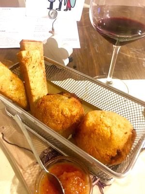 Arancini e panelle di ceci. Deep fried rice balls and sicilian chickpea fritters with onion chutney. Delicious!! at Gioia in Fano