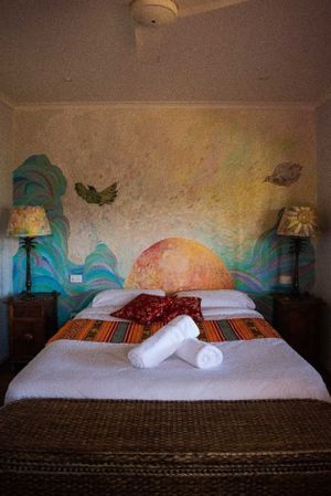 Many of the rooms feature murals. at Paradise One Retreat in Coorabell