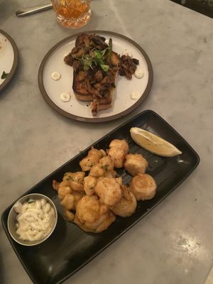 Mushroom crostini and hearts of palm ‘calamari'  at LOV - McGill in Montreal