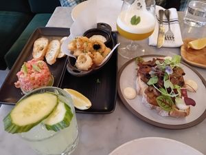 To left salmon tartar, calamari rings, mushroom sandwich at LOV - McGill in Montreal