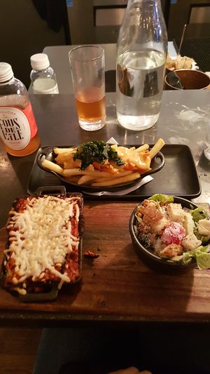 Lasagne-salad, potatoes fries at LOV - McGill in Montreal