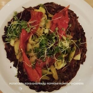 Rösti with leeks, peppers, romesco and capers at Avelo in Toronto