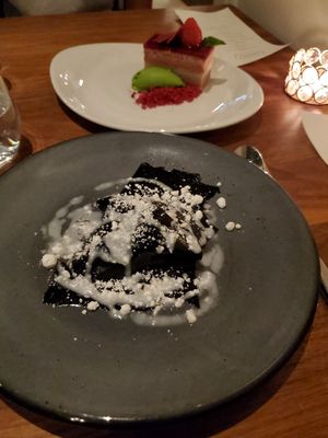 Fermented fruit leather with amazaki. There are stone fruit hiding underneath. at Avelo in Toronto