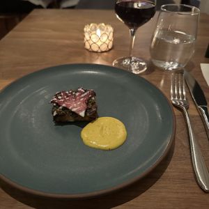 5th Course: Black-eyed Pea Tempeh, Radicchio, Pistachio   at Avelo in Toronto