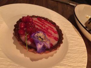Red currant tart with gingerbread crust at Avelo in Toronto