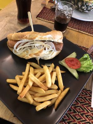 Good hot dog, 2 sausages in it. The sausage has a smoky taste. Great bun and comes with fries  at Vegan Heaven in Chiang Mai