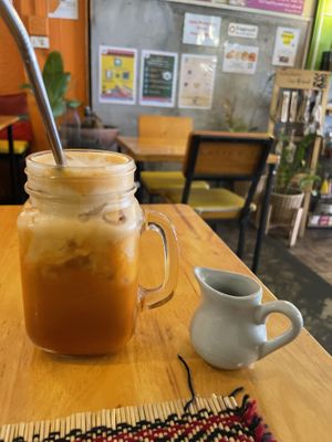 Thai tea with simple syrup on the side   at Vegan Heaven in Chiang Mai