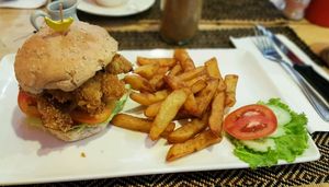 Vegan chicken burger and chips at Vegan Heaven in Chiang Mai