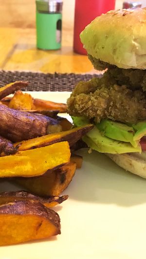 “Chicken” burger and sweet potato fries  at Vegan Heaven in Chiang Mai